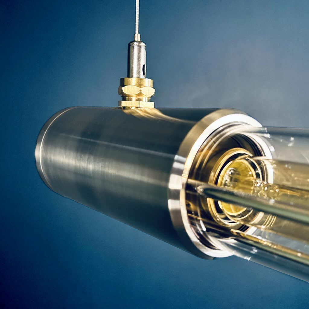 Shop for a industrial style linear ceiling light, installed with Edison LED filament tubes. British designed and made. Manufactured with high quality materials aluminium and glass.